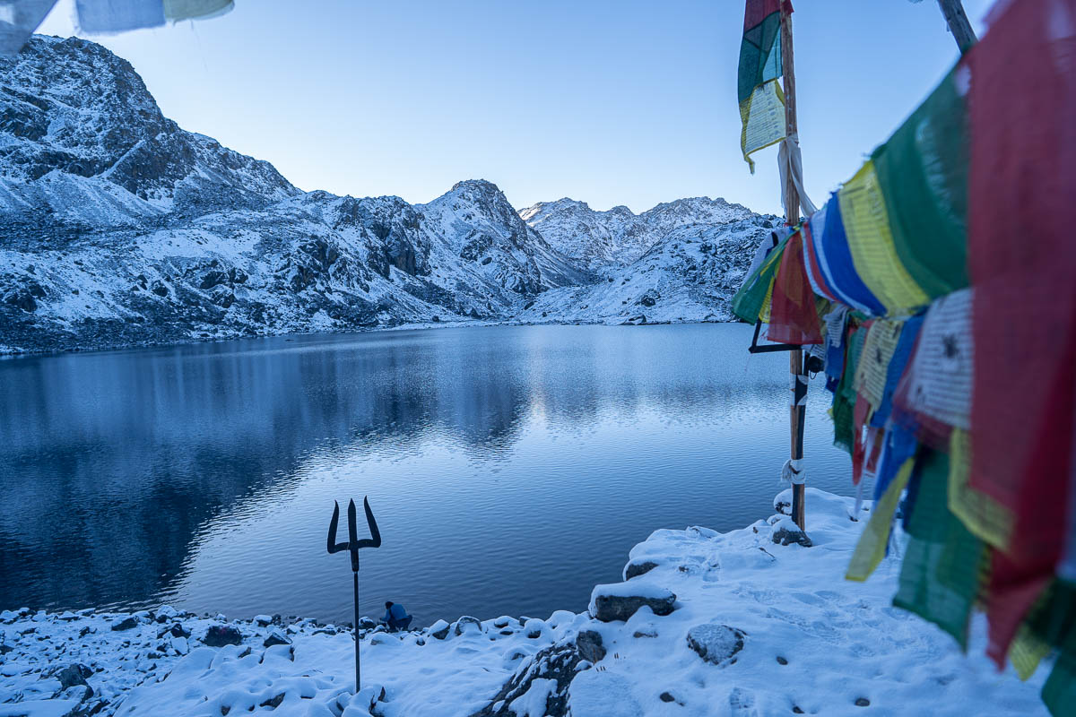 Langtang Region Snow-capped peaks and lake of Nepal seen from high altitude trekking route, highlighting the best time to visit Nepal for mountain views