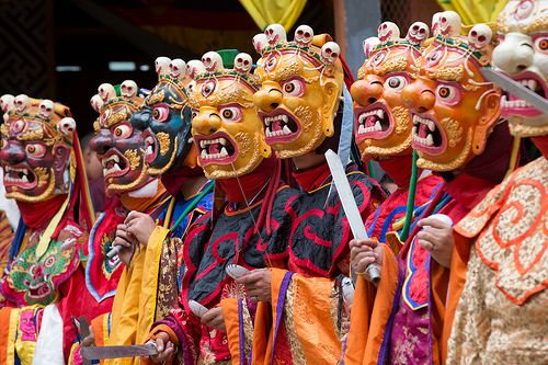 Festival mask dance in Nepal with elaborate costumes and expressive ceremonial movement