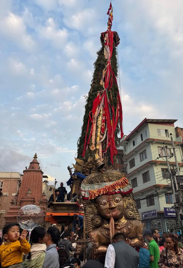 Colourful Rath Yatra chariot procession in Nepal with devotees pulling wooden chariot through streets