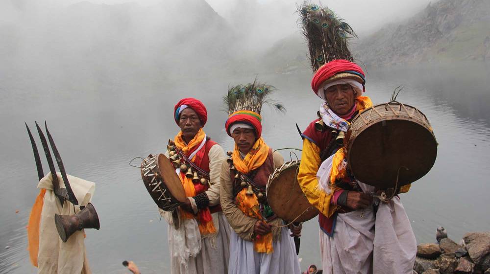 Locals celebrating a traditional festival in Kathmandu Valley with music and rituals, showcasing Nepal’s seasonal cultural heritage